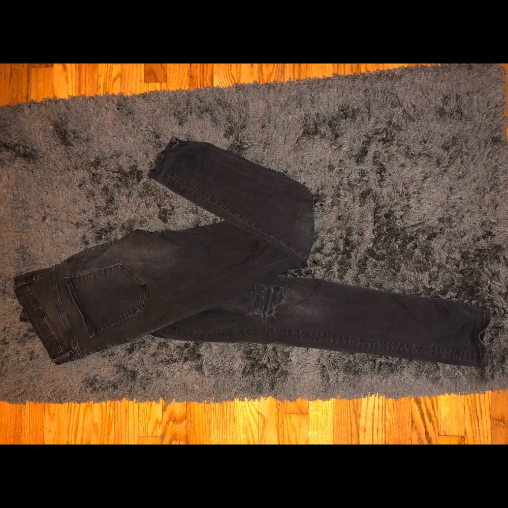Black distressed jeans with holes in knees